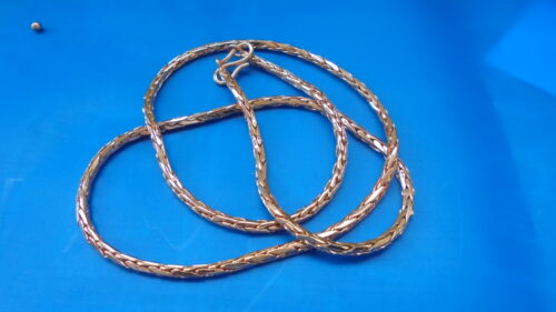 Item A 27.6 grams one piece